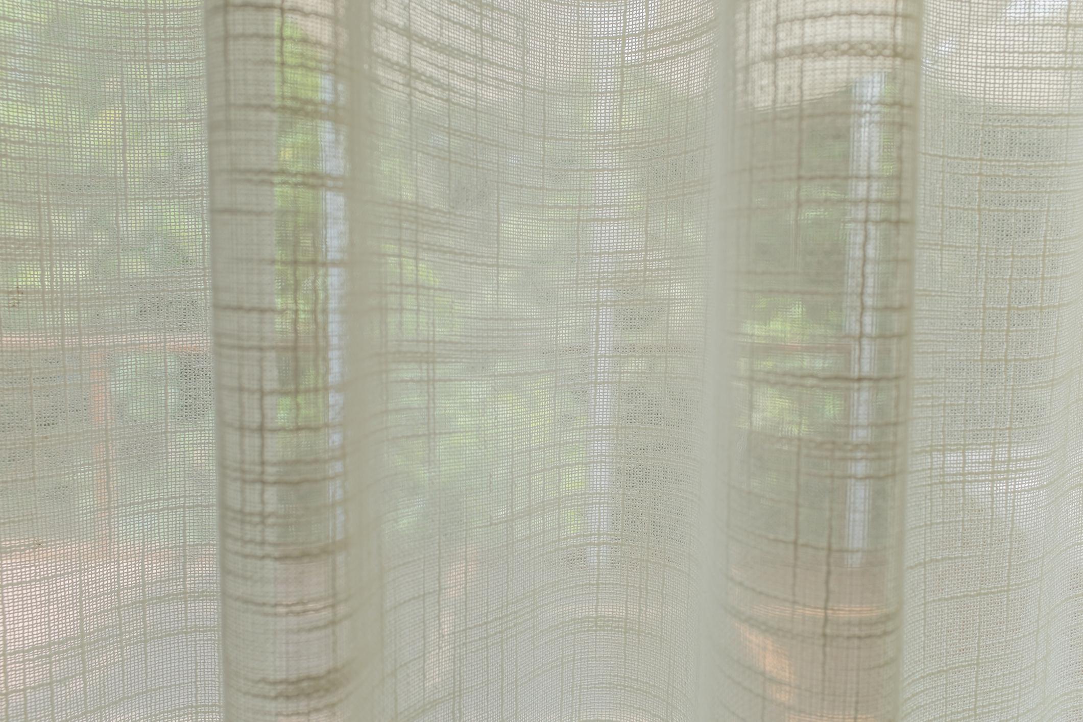 Soft light on skin and fabric representing the subtle, close-wearing nature of skin scent perfumes